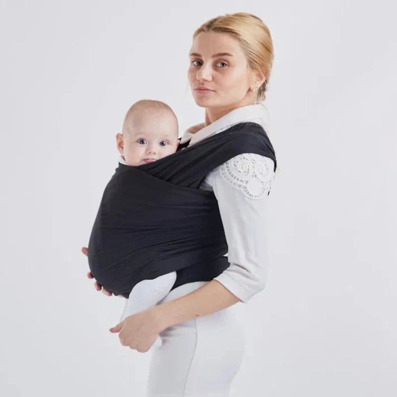 bebe contre maman dans écharpe de portage bébé