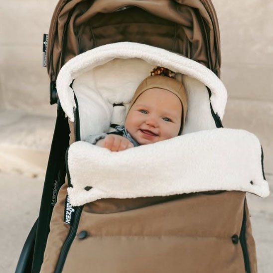 bebe heureux dans Chanceliere bebe douillette