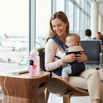 chauffe-biberon portable nomade à l'aéroport