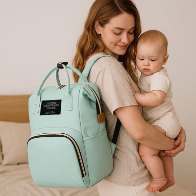 maman porte bebe et sac a dos a langer vert