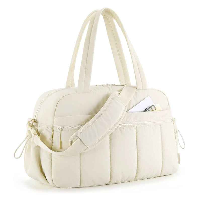 sac à langer pratique nombreuses poches spacieux beige