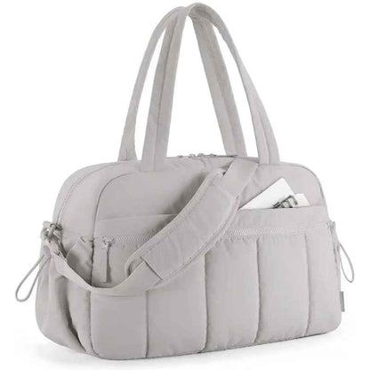 sac à langer pratique nombreuses poches spacieux détails fermeture